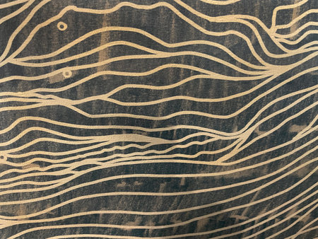Abstract pattern with flowing beige lines on a dark textured background. Artistic wavy design resembling topographic map or wood grain, perfect for modern decoration, wallpaperの写真素材