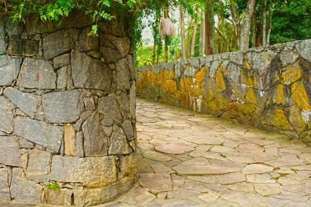 Building vintage stone way crossing parkの写真素材