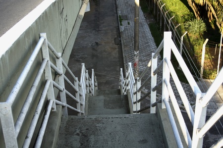 Staircase building join at to viaduct to passed peopleの写真素材