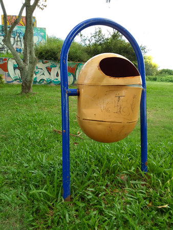 Bin on a playground in a park, closeup of photoの写真素材