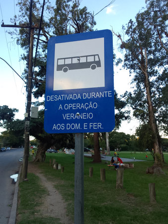 Bus stop sign at a park in the city of Colombo in Sri Lanka.の写真素材