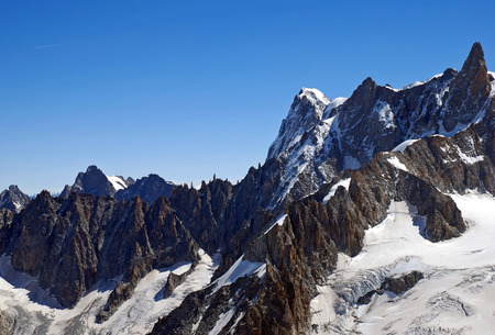 Sharp rock ridges of high mountainsの写真素材