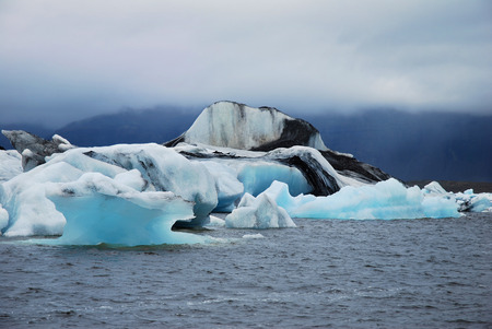 Iceland's glacier lake  Jokulsarlon with its blue floating icebergsの写真素材