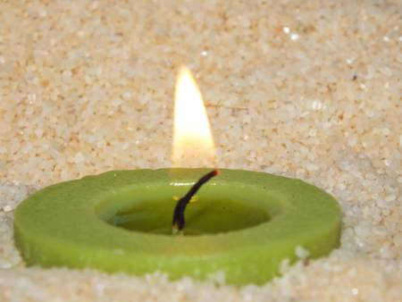 colored burning candleの写真素材