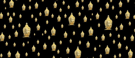 many small golden buddha heads in a patternの写真素材