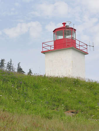 Old Red Lighthouse on Nova Scotia coastline, Canadaの写真素材