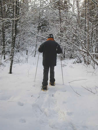 Active senior in snowshoes, Quebec, Canadaの写真素材