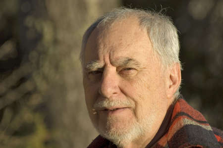Outdoor portrait of a senior man smiling