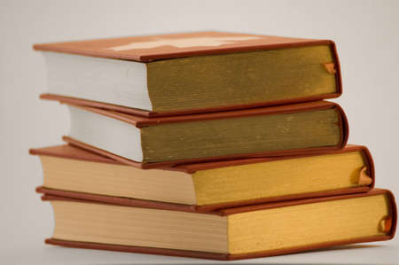 close up of golden and red booksの写真素材