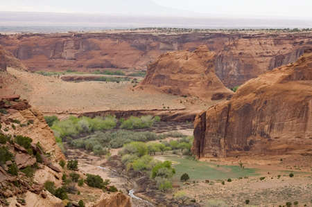 Aerial view of Navajo' s farms land , houses and  the Little Colorado River at the Canyon De Chelly, Arizona.の写真素材