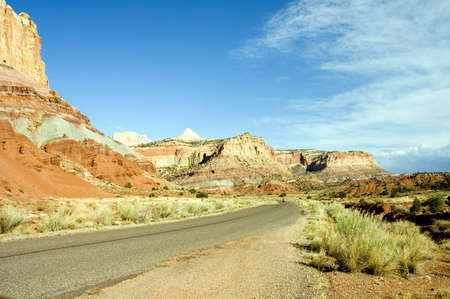 Riding into the uniqueness canyon of Capitol Reef, Utah, by the dirt roadの写真素材