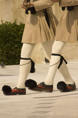 Guards (Evzones) in front of the Tomb of the Unknown Soldier in front of Parliament Athens Greeceの写真素材