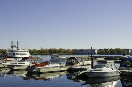 KINGSTON, ONTARIO - OCTOBER 19: Pleasure boats and passengers boat anchored on Ontario lake, Kingston, Ontario, Canada, 19 October 2008のeditorial素材