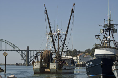 Newport, Oregon, USA - Mai 13th, 2006 : fishermen boat crane in Newport, Oregonのeditorial素材