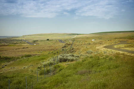 Palouse, Wa, USA - May 15th, 2006 : Riding through farmlands on the ocean of green rolling hills  of Washington state, USA のeditorial素材