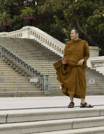 Washington DC, USA - June 25th, 2007 : monk buddhist posing on the stairs of Capitol, Washington DC, USAのeditorial素材