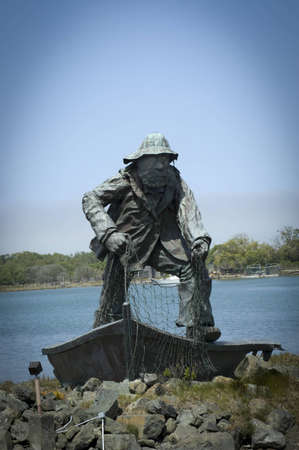 Woodley Island, California - May 9th, 2006 : The Fisherman, memorial statue created by artist Dick Crane, commemorating the mariners who have lost their lives at sea . May 9th, 2006 in Woodley Island, Californiaのeditorial素材