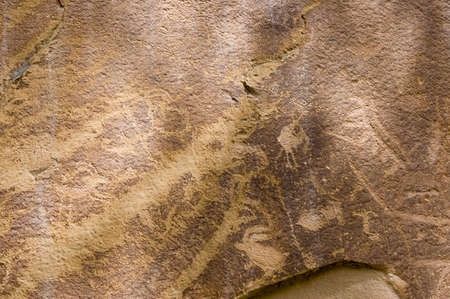 Utah, USA - April 29th, 2006 : Petroglyph or rock art carvings of Native Americans on a canyon wall in Freemont,  National Park Capitol Reef  Utah, USAのeditorial素材