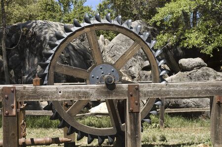 California, USA - May 5th, 2006 : antique tractor wheel in exhibition on western country of...