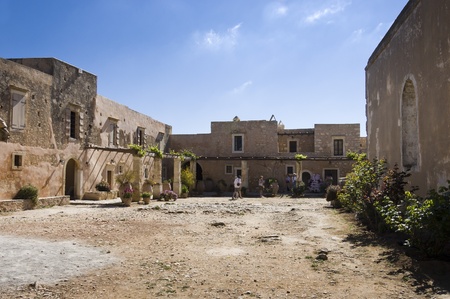 Rethymnon, Greece - May 11th, 2007 : Tourists on the courtyard of the Greek Orthodox Arkadi monastery, founded on 14th century AD,  Crete,  Greeceのeditorial素材