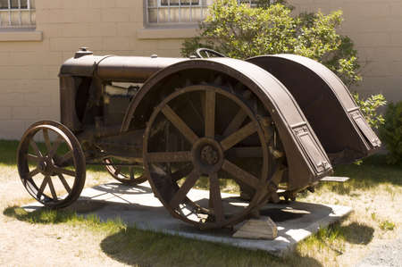 Frontier Town, Montana, USA -  May 16th, 2006 : antique iron tractor on display in street of rural...