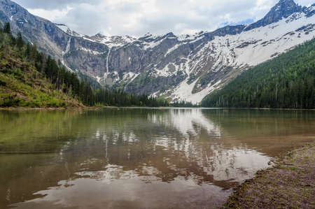 Scenic view of Avalanche Lake and glaciers in Glacier National Park, Montana,USAの写真素材