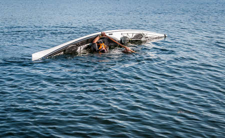 man rolling with a kayak on a lake - serial pictures 6 of 11の写真素材