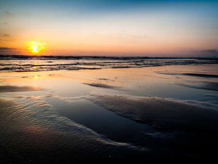 Cape Lookout sunset from the beachの写真素材
