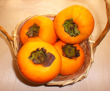 Local fruit, ripe persimmonsの写真素材