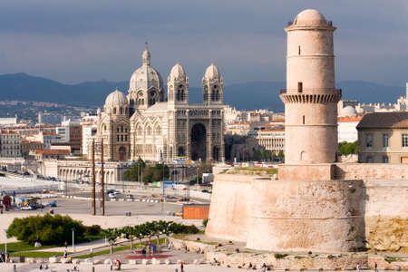Medieval Fortress and cathedral on the waterfront in Marseille Franceの写真素材