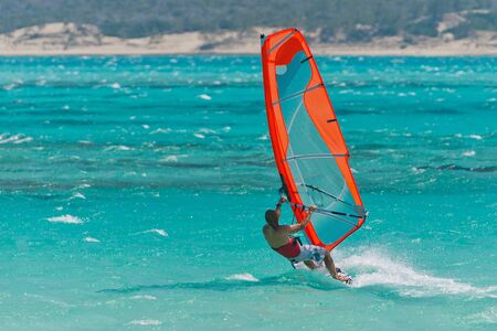 Windsurfer windsurfing in the lagoon