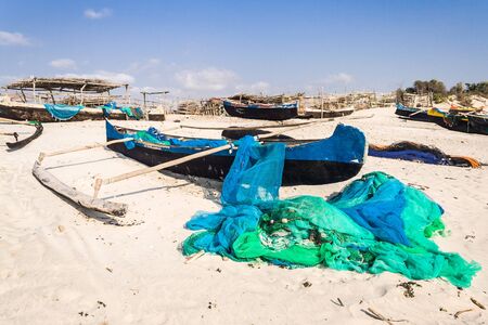 Fishing canoes on the beach of Itampolo, southern Madagascarの写真素材