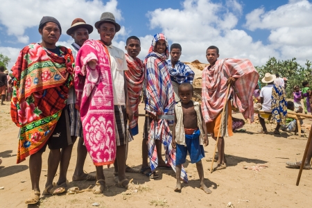 ITAMPOLO, MADAGASCAR - OCT 19: Group of Malagasy mens unidentified of ethnic Antandroy in the weekly market of Itampolo in the deep south of Madagascar on october 19, 2006. Antandroy are a nomadic ethnic group of Androy region, and live mainly from fishinのeditorial素材