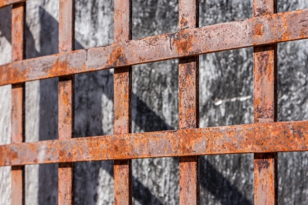Rusty bars of prison with perspectiveの写真素材