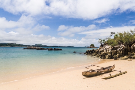 Outrigger canoe o the beach of Nosy Be, Madagascarの写真素材