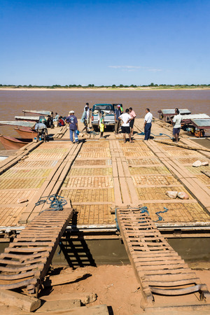 BELO SUR TSIRIBIHINA, MADAGASCAR, JUL 3:  Unidentified people waiting ferry  on jul 3, 2006 on the jetty of Belo sur Tsiribihina, western Madagascarのeditorial素材