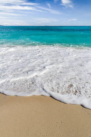 Foam on the beach of Nosy Iranja (Nosy Be), Madagascarの写真素材