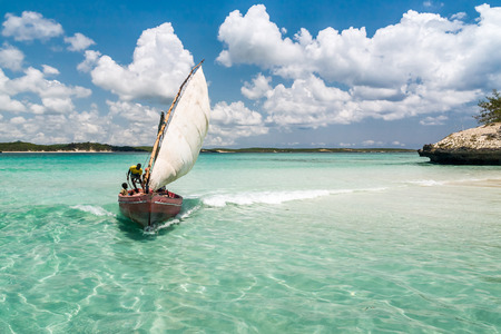 ANTSIRANANA, MADAGASCAR - NOV 19: Unidentified fishermen in a traditional fishing boat in the Emerald Sea of Antsiranana (Diego Suarez), north of Madagascar, on nov 19, 2008のeditorial素材