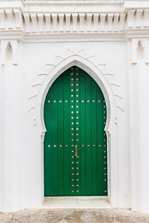 Moroccan door in the medina of Asilah, Moroccoの写真素材