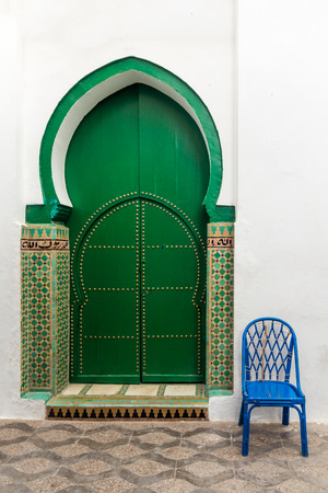 Door of the Mosque in the medina of Asilah, Moroccoの写真素材