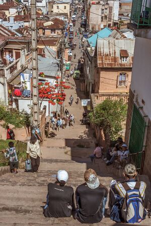Antananarivo, Madagascar, May 16, 2017: Young people sitting on the steps of Antananarivo, Madagascarのeditorial素材