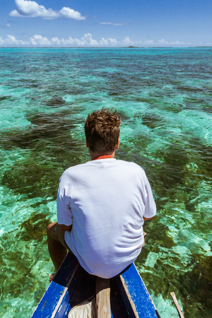 Antsiranana, Madagascar, November 19, 2016: A tourist  watching the seabed of the Emerald Sea of Antsiranana (Diego Suarez), north of Madagascarのeditorial素材