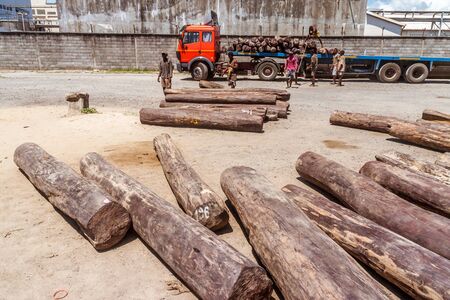 Toamasina, Madagascar, April 12, 2014: Loading of rosewood on trucks at the port of Toamasina (Tamatave), East of Madagascarのeditorial素材