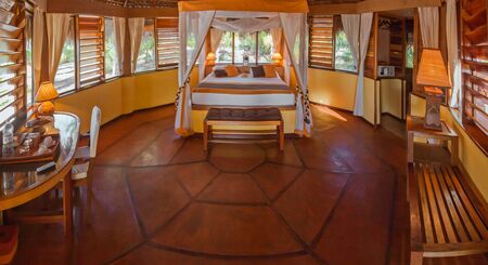Bedroom of a luxury tropical bungallow suiteのeditorial素材