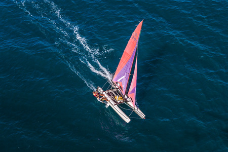 Nosy Be, Madagascar, June 26, 2017: Two sailors sailaing their hobie cat in the Indian Oceanのeditorial素材
