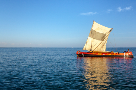 Anakao, Madagascar, october 21, 2016: A traditional outrigger canoe sailing off Anakao in southern Madagascarのeditorial素材