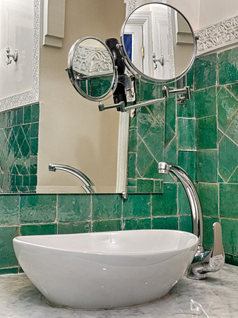 Designed washbasin in retro bathroomの写真素材