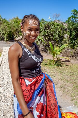 Antsanitia, Madagascar, September 27, 2016: Malagasy woman with her traditional outfit and beauty mask in Antsanitia, Western Madagascarのeditorial素材