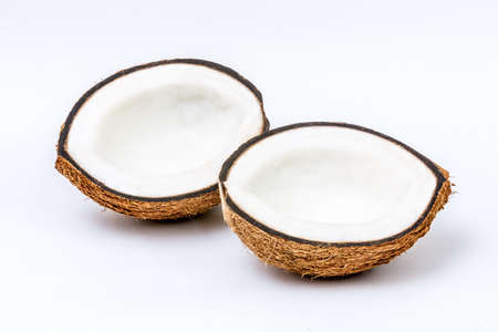 Ripe coconut open isolated on white backgroundの写真素材