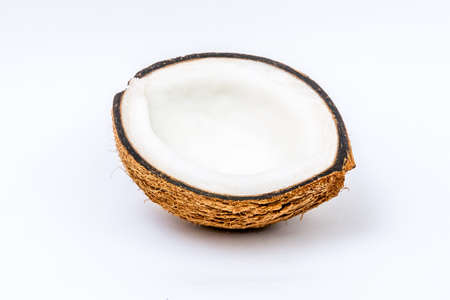 Ripe coconut open isolated on white backgroundの写真素材